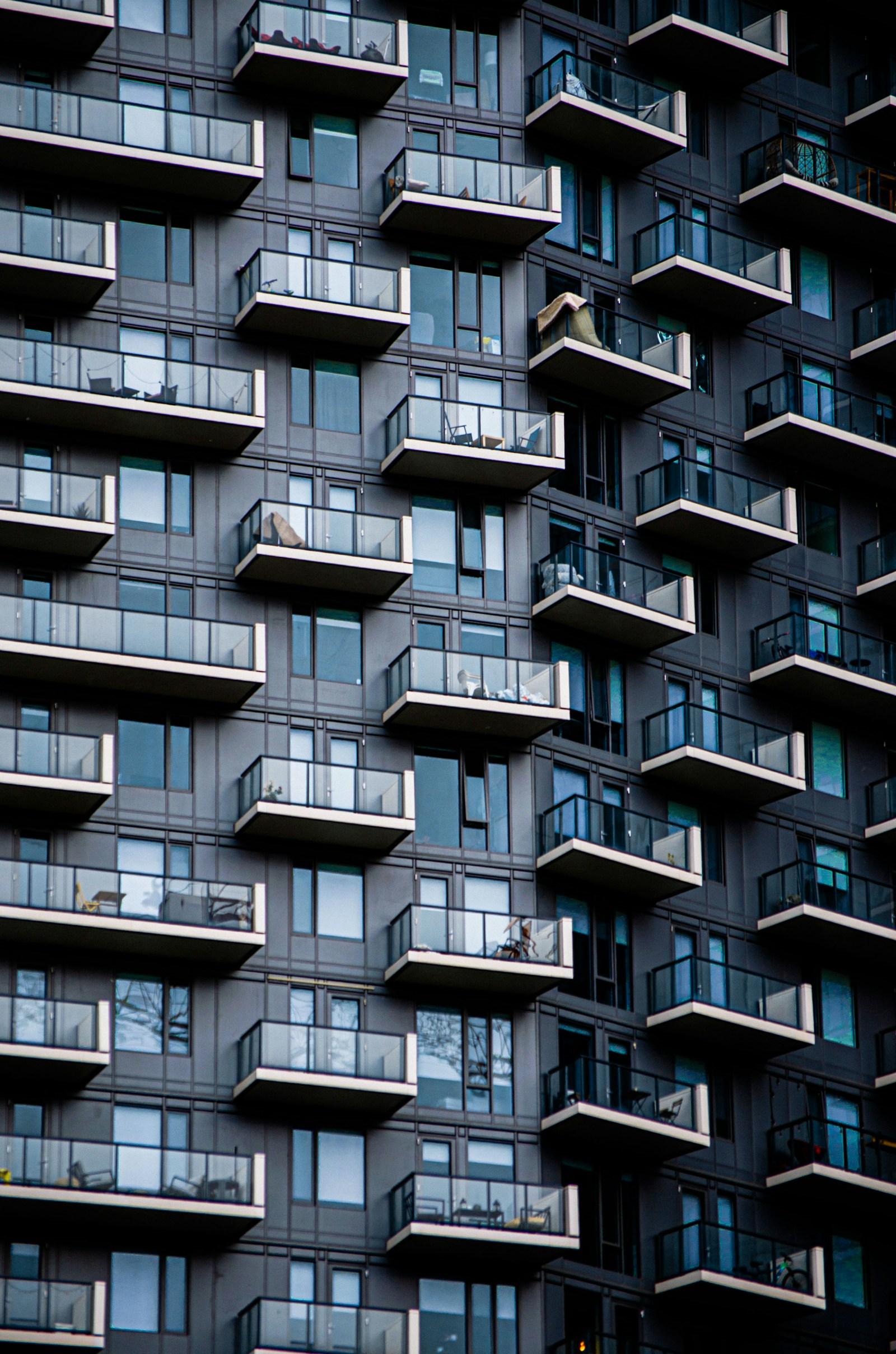 Layered glass balconies on a contemporary residential building